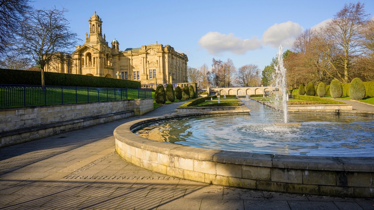 Cartwright Hall in Lister park, Bradford, Yorkshire viewed from the Mughal water gardens.
