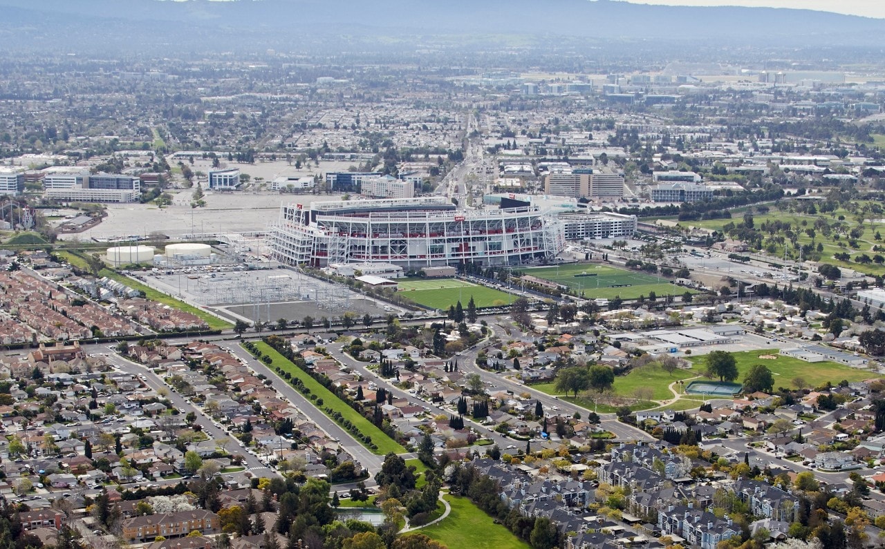 Aerial photography view west of Levi's Stadium, Santa Clara in the San Francisco Bay Area. The picture includes Renaissance, Ulistac Natural Area and Santa Clara Youth Soccer Park. CA 95134. San Francisco, California, United States.