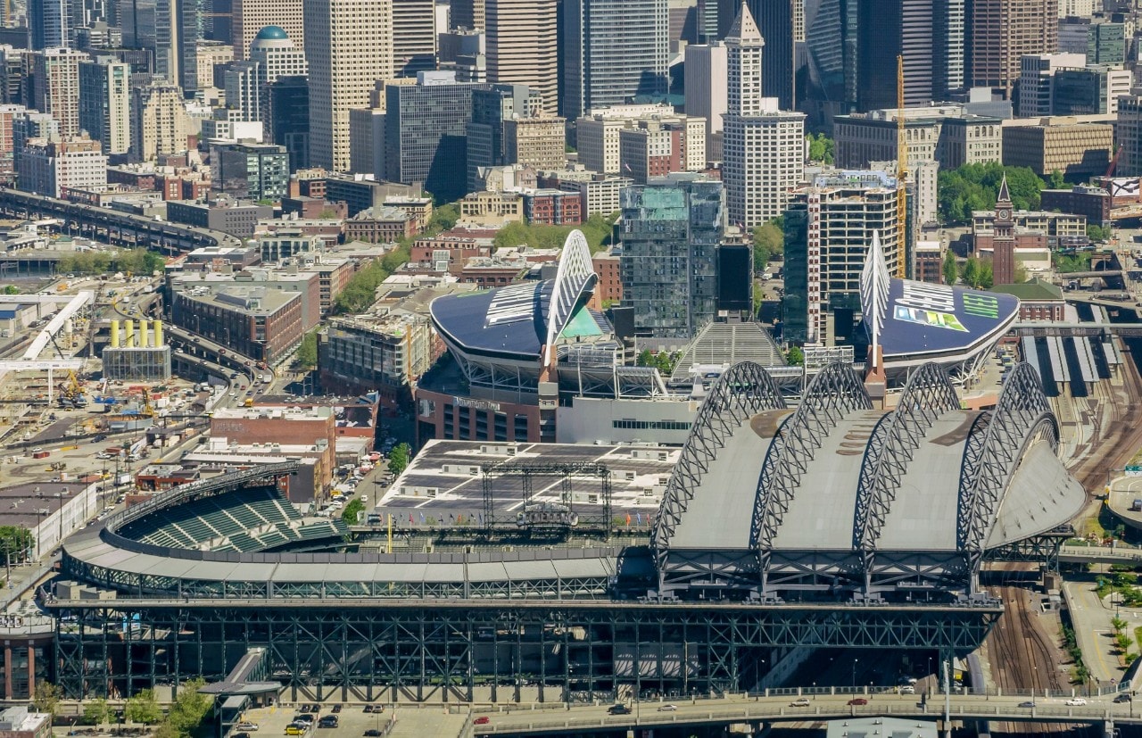 View of crowded modern cityscape with CenturyLink Field stadium, Seattle, Washington, United States.